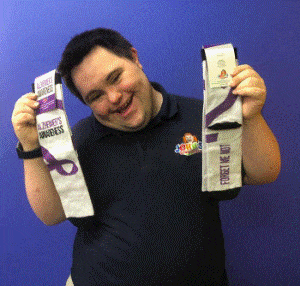 John’s Crazy Socks Supports LuMind RDS with Alzheimer’s “Forget Me Not” Socks